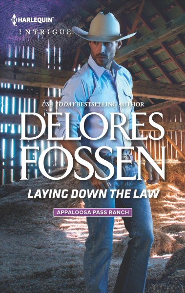 Laying down the law / Delores Fossen.