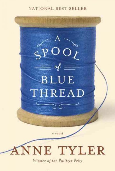A spool of blue thread.