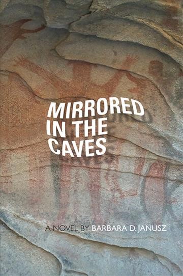 Mirrored in the caves : a novel / by Barbara D. Janusz.